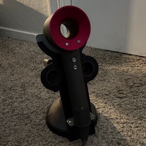 Dyson Hair Dryer with Black and Pink Design